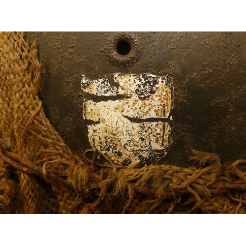 1260 - German WWII Helmet - Hessian Sacking Camouflage held in-place with a strand of barbed wire.