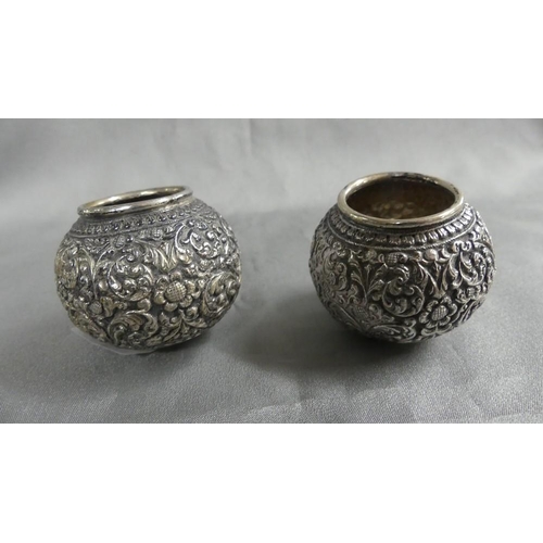 2215 - Pair of Chased & Engraved Indian Silver Spherical Mounts.