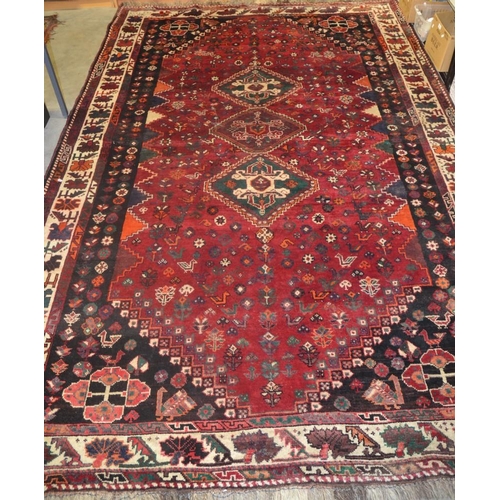 2533 - Large Good Quality Red Ground Eastern Wool Rug - approx 308 x 205cm.