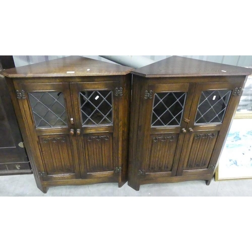 3059 - Pair Of Oak Linen Fold Corner Cabinets.