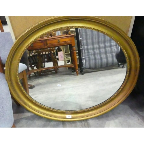 3111 - Large Oval Gilt Framed Wall Mirror, approx 88cm across.