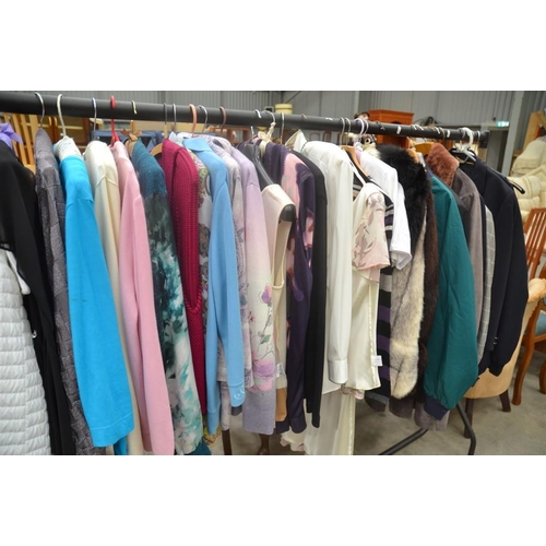 3264 - Large Rail Of Assorted Clothing including Fur Coat, Jackets & Jumpers