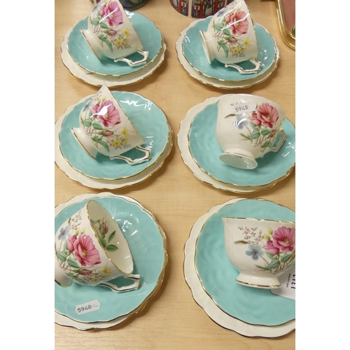 1312 - Six Aynsley Bone China Floral Pattern Trios.