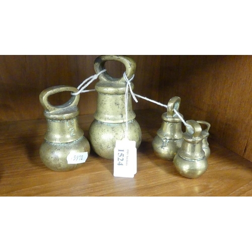 1524 - Five Graduated Brass Bell Shaped Weights.