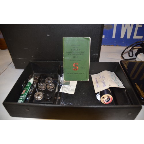 579 - Singer Sewing Machine Model 221-1, with Accessories In Hard Carry Case. S/N AH640661