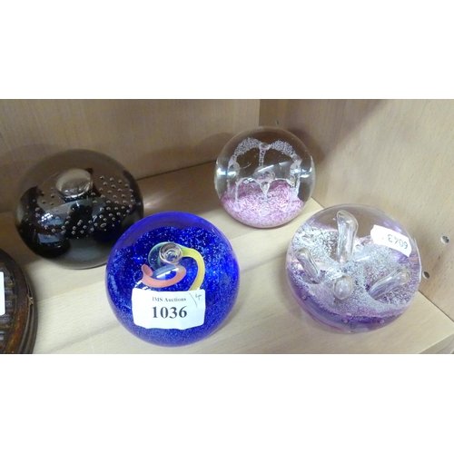 1036 - Four Caithness Glass Paperweights.