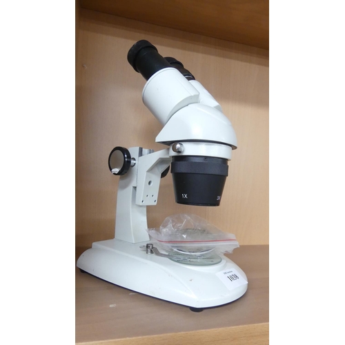 1038 - Binocular Microscope by Apex.