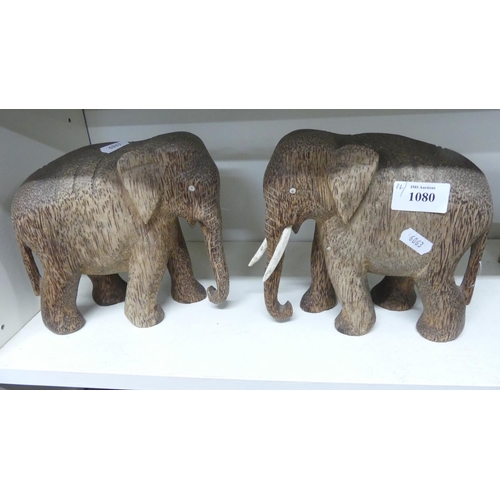 1080 - Pair of Carved Wooden Elephants.