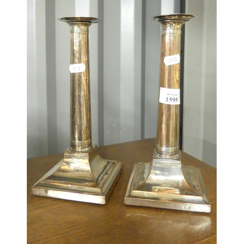 1595 - Pair of Silverplated Candlesticks on Square Stepped Bases 25cm tall.