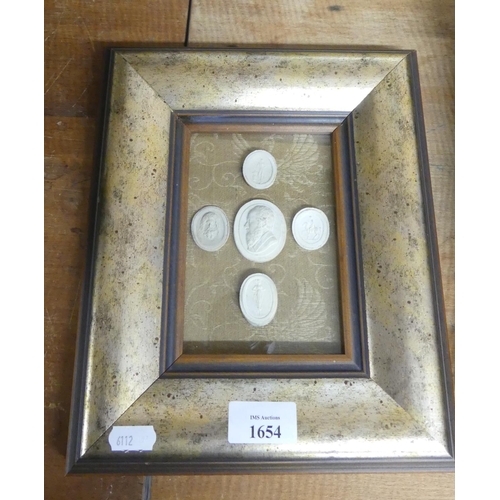 1654 - Framed Plaster Medallions, approx 23 x 28cm.