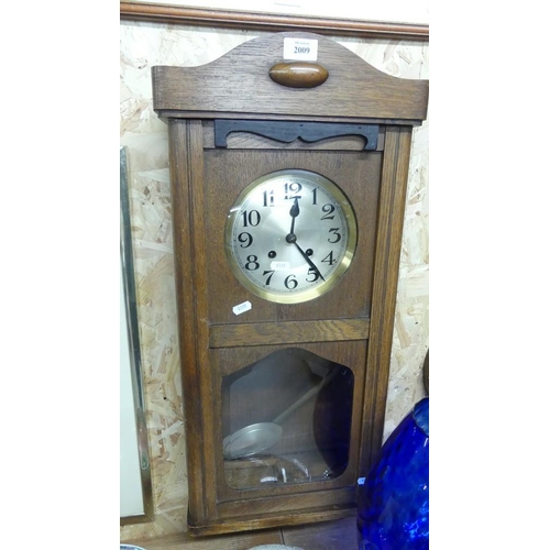 2009 - Oak Cased Wall Clock.