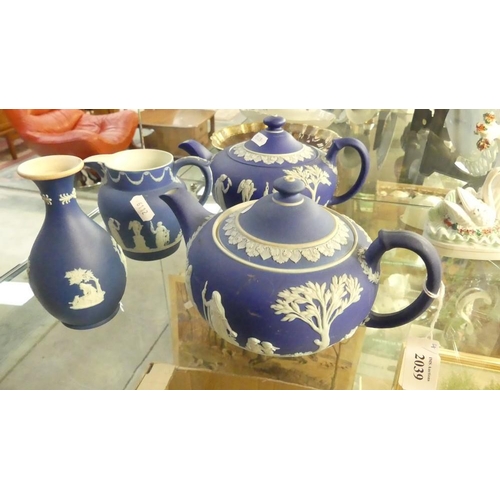 2039 - Two Wedgwood Blue Jasper Teapots, Jug & Vase.