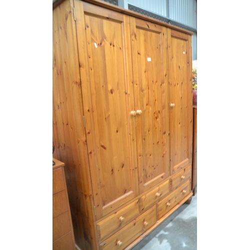 3064 - Pine Triple Wardrobe With Drawer Base