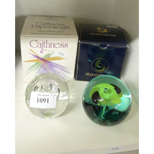 1091 - Two Glass Paperweights - Caithness & Selkirk.