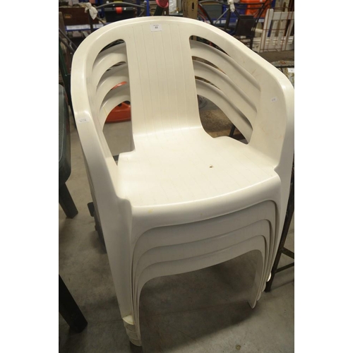 55 - 4 White Plastic Stacking Garden Chairs