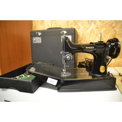 611 - Singer Sewing Machine Model 221-1, with Accessories In Hard Carry Case. S/N AH640661