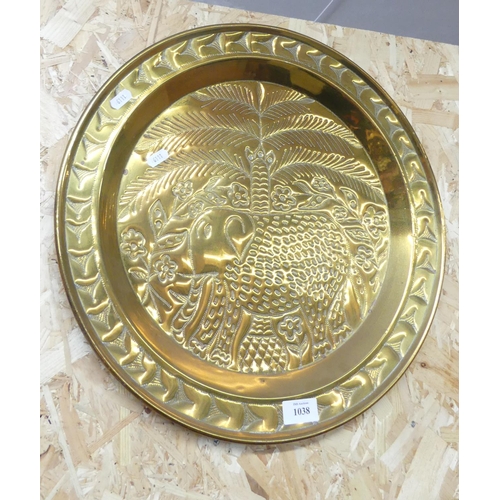 1038 - Brass Wall Plaque - Elephant & Palm Trees, approx 45cm in diameter.