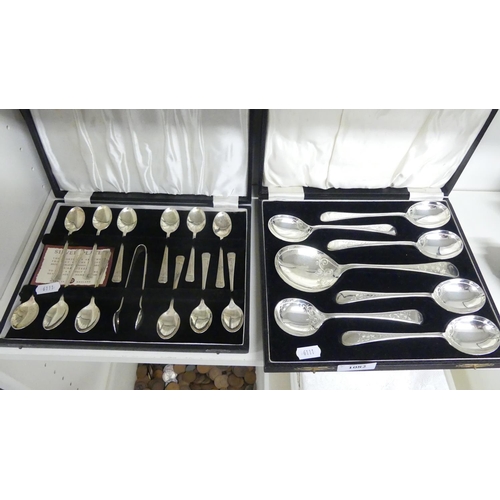 1082 - Cased Sets of Dessert Spoons & Teaspoons.