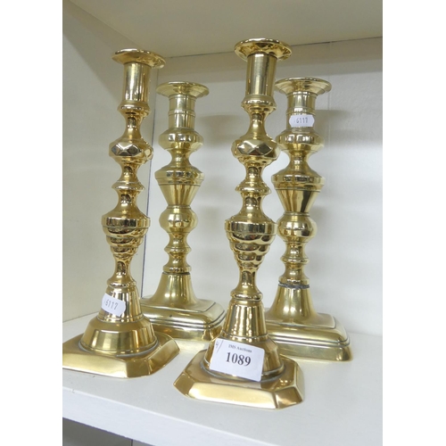 1089 - Two Pairs of Brass Candlesticks.