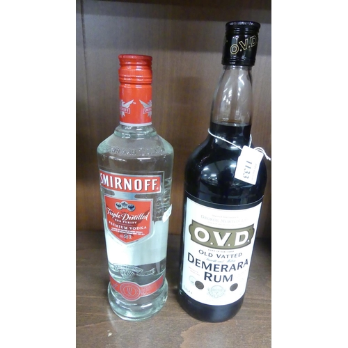 1133 - Bottle of OVD Rum & Smirnoff Vodka.