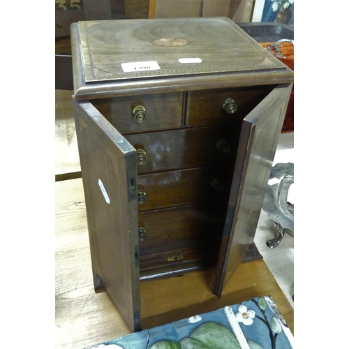 1390 - Edwardian Mahogany Jewellery Cabinet of drawers, all drawers lined with blue velvet, one fitted to t... 