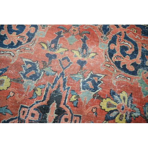 3345 - Very Large Persian Design Wool Rug, foliate shapes on a red ground within a deep border , approx 360... 