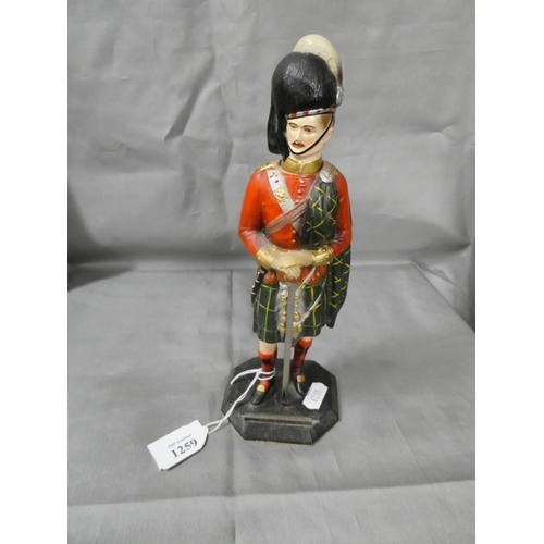 1259 - Painted Metal Scottish Highland Soldier Table Lighter.