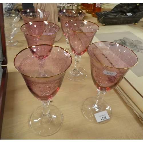 1428 - Set of Six Cranberry Tinted and Engraved Wine Glasses.