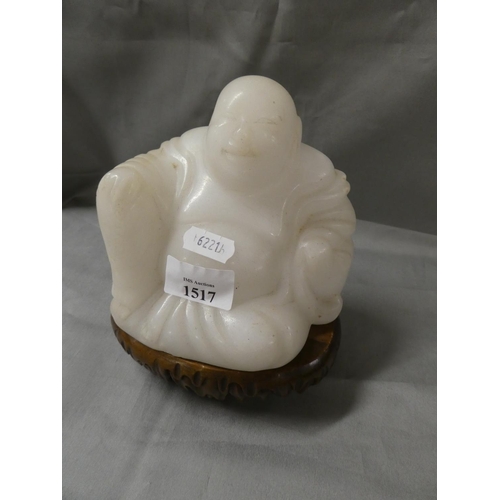 1517 - Chinese Carved White Hardstone Buddha on Carved hardwood Stand, approx 16cm tall overall.