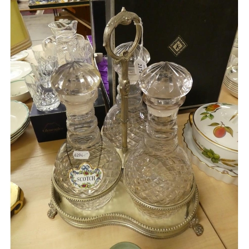 2174 - Three Cut Glass Decanters on Plated Stand.