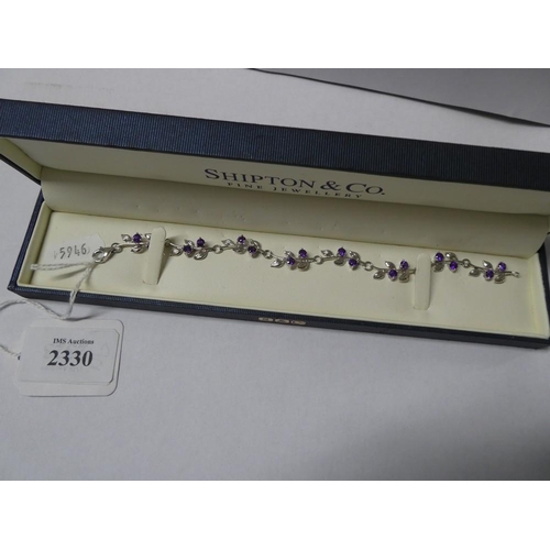 2330 - Silver Leaf Design Bracelet set with 16 Amethysts.