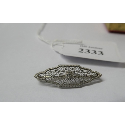 2333 - White Metal Filigree Brooch with Central Diamond.