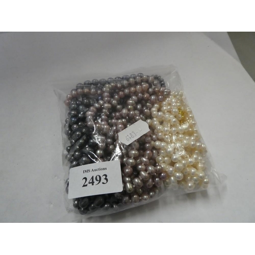 2493 - Bag of Faux pearl Necklaces.