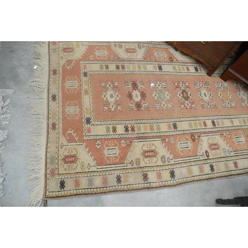 3502 - Fringed and Bordered Geometric Rug on Brown Ground. Approx 115cm x 195cm