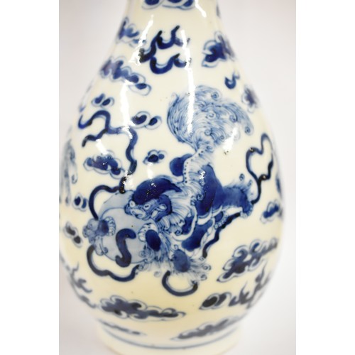 1531 - Chinese B & W Bottle Shaped Vase, painted with Foo Dogs (Temple Lions), approx 31cm tall, painted fo... 