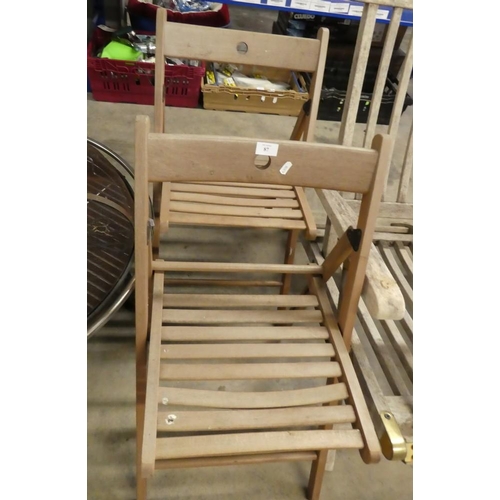 87 - 2 Folding Teak Chairs