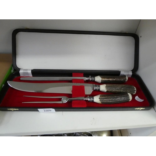 1009 - Cased Antler Handled Carving Set.