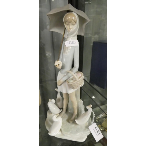 1239 - Lladro Porcelain Figure - Girl holding Umbrella.