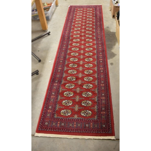 2512 - Modern Red Ground Bukhara Wool Runner, approx 66 x 150cm.