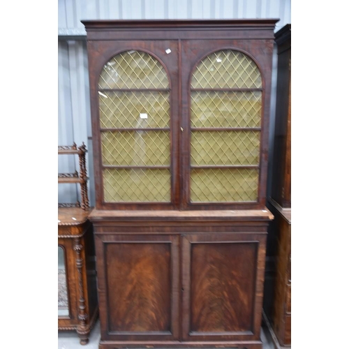 3002 - Victorian Mahogany Bookcase on Cupboard Base.  Glazed Bookcase Doors with Brass Mesh Decoration