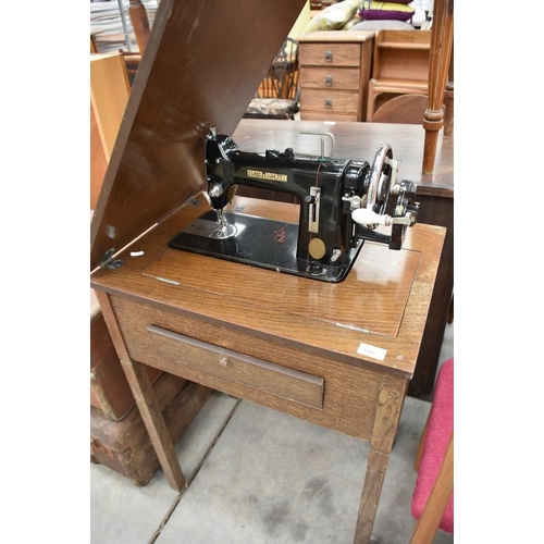 3266 - Frister & Rossmann Sewing Machine In Oak Cabinet