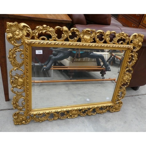 3349 - Ornate Gilt Framed Bevelled Wall Mirror - 47cms x 68cms