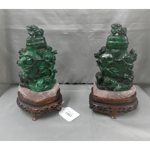 1503 - Pair of Chinese Malachite Temple Jars on Rose Quartz supported on carved hardwood bases.