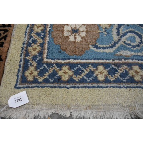 3292 - Vintage Fringed and Bordered Wool Rug on a Blue /Yellow Ground. Measures approx. 300 x 248cm