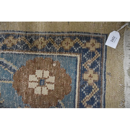 3292 - Vintage Fringed and Bordered Wool Rug on a Blue /Yellow Ground. Measures approx. 300 x 248cm