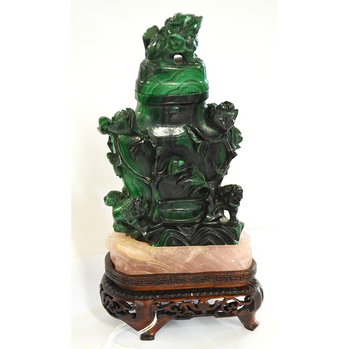 1503 - Pair of Chinese Malachite Temple Jars on Rose Quartz supported on carved hardwood bases.