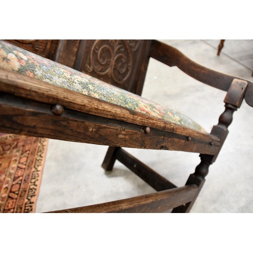 3196 - Heavily Carved Antique Oak Hall Settle with Fabric Upholstered Seat