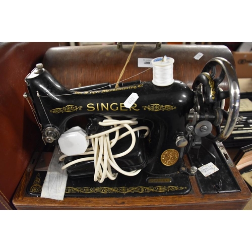 400 - Vintage Singer Sewing Machine and a Leather Case