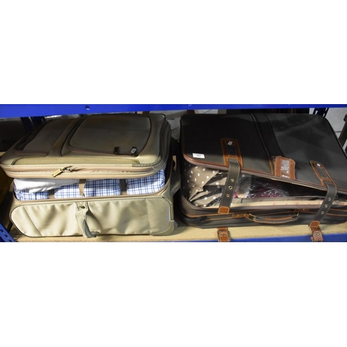 415 - 2 Suitcases containing Cushions, Bedding etc