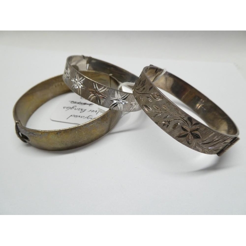 2341 - Three Engraved Silver Bangles (3.2t)